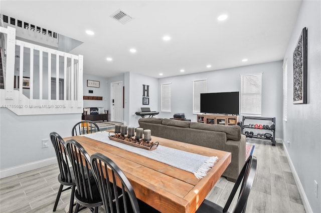 11640 SW 243rd St, Homestead, FL 33032 - dining area featuring light wood finished floors, baseboards, recessed lighting, and visible vents