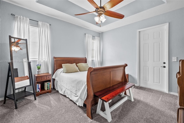 11640 SW 243rd St, Homestead, FL 33032 - carpeted bedroom with baseboards, a ceiling fan, and a raised ceiling