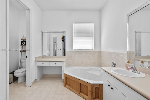 11640 SW 243rd St, Homestead, FL 33032 - full bathroom with a bath, vanity, and toilet