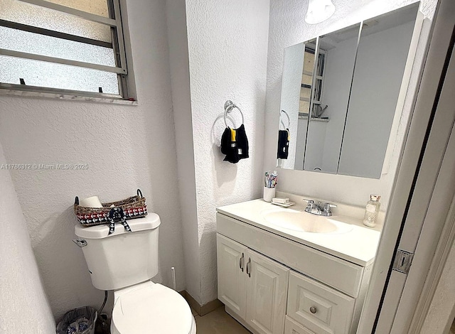 8820 Fontainebleau Blvd Unit 104, Miami, FL 33172 - half bathroom with a textured wall, toilet, and vanity