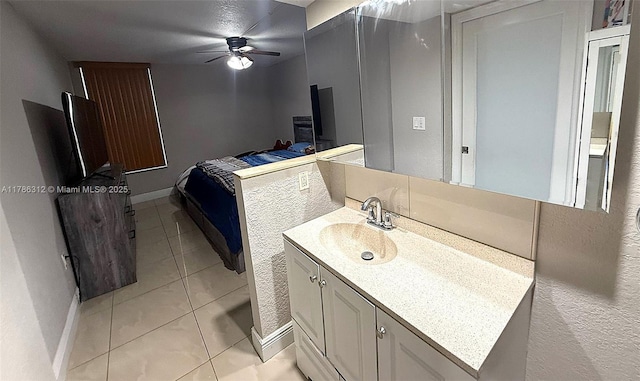 8820 Fontainebleau Blvd Unit 104, Miami, FL 33172 - bathroom featuring vanity, tile patterned floors, baseboards, and ceiling fan