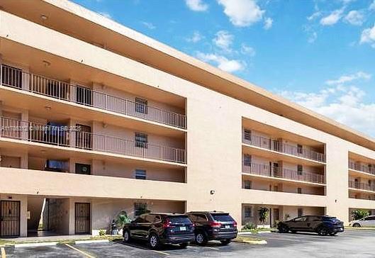 8820 Fontainebleau Blvd Unit 104, Miami, FL 33172 - view of property with uncovered parking