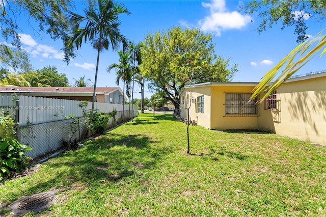 view of yard featuring fence