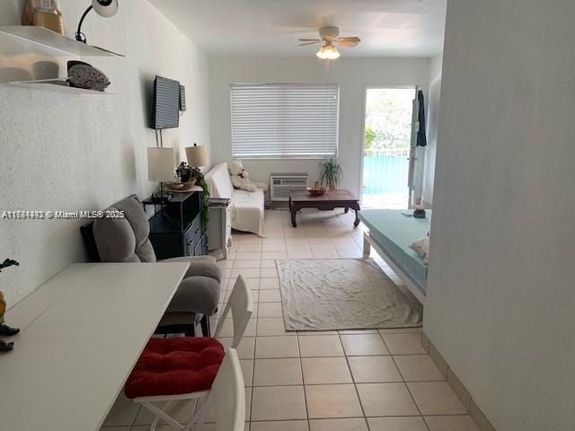 200 76th St Unit 57, Miami Beach, FL 33141 - living room featuring light tile patterned floors and ceiling fan