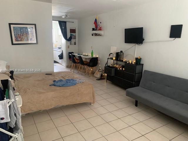 200 76th St Unit 57, Miami Beach, FL 33141 - living room with light tile patterned floors