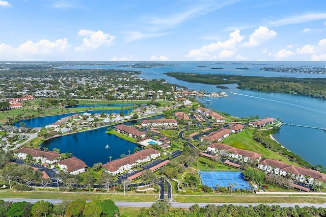 6081 SE Landing Way Unit 8, Stuart, FL 34997 - aerial view of property and surrounding area featuring a large body of water and nearby suburban area
