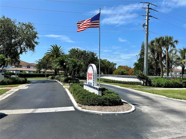 6081 SE Landing Way Unit 8, Stuart, FL 34997 - view of asphalt street with curbs