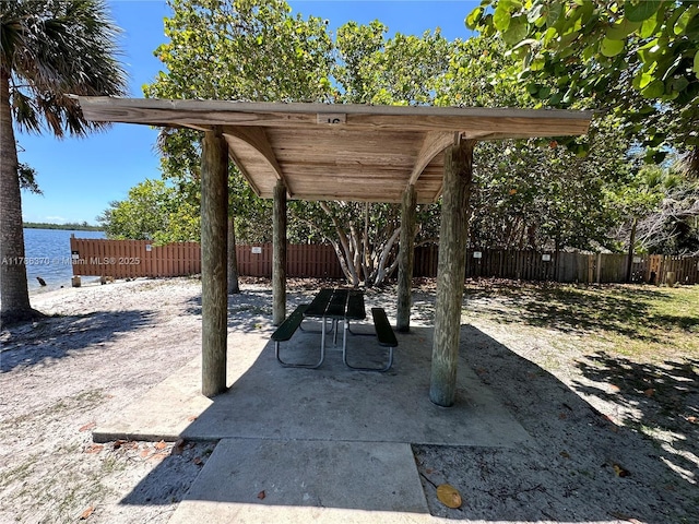 6081 SE Landing Way Unit 8, Stuart, FL 34997 - view of patio featuring a water view
