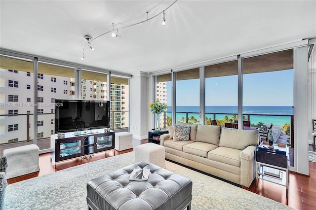 3101 S Ocean Dr Unit 701, Hollywood, FL 33019 - living area featuring wood finished floors and floor to ceiling windows