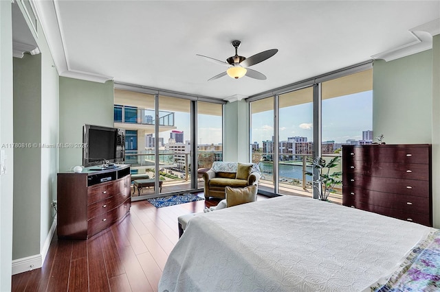 3101 S Ocean Dr Unit 701, Hollywood, FL 33019 - bedroom with floor to ceiling windows, access to exterior, ornamental molding, dark wood-type flooring, and baseboards
