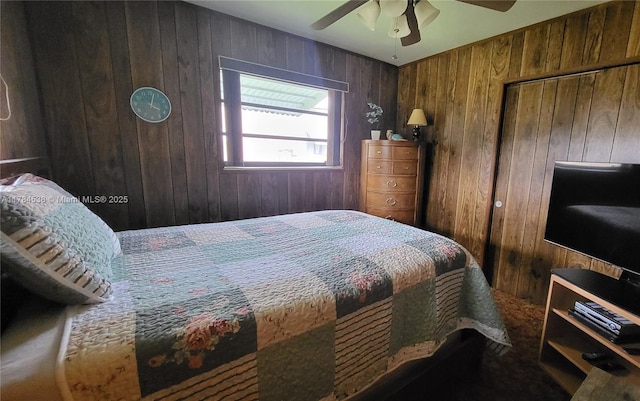 521 N 70th Way, Hollywood, FL 33024 - bedroom featuring wooden walls and a ceiling fan