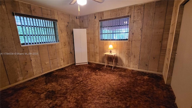 521 N 70th Way, Hollywood, FL 33024 - carpeted spare room featuring healthy amount of natural light, wooden walls, and ceiling fan