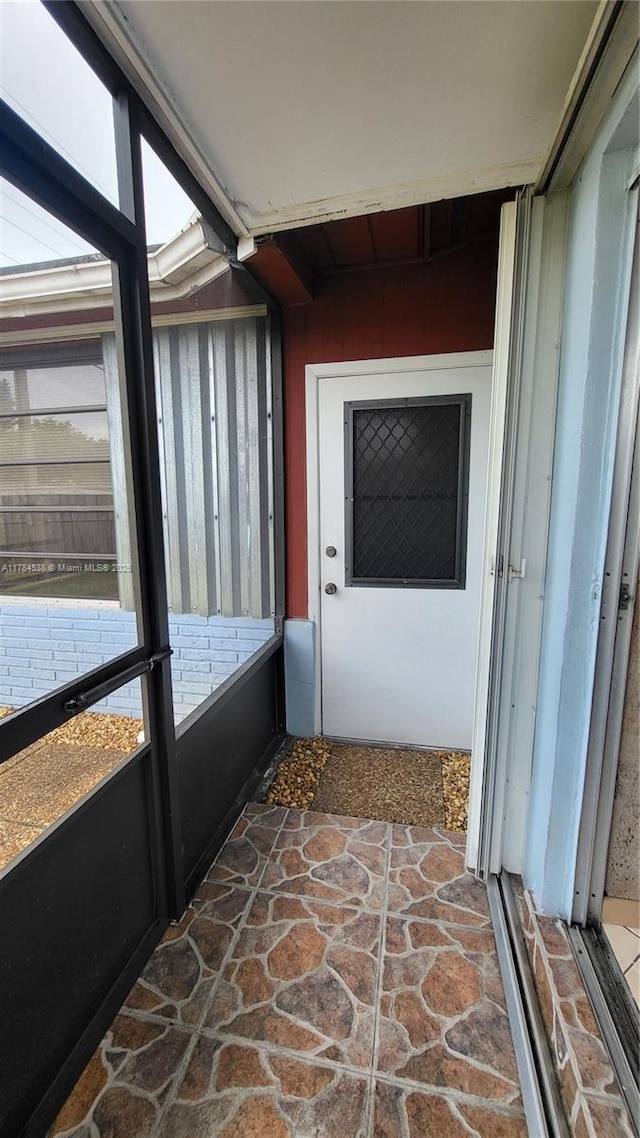 521 N 70th Way, Hollywood, FL 33024 - unfurnished sunroom featuring healthy amount of natural light