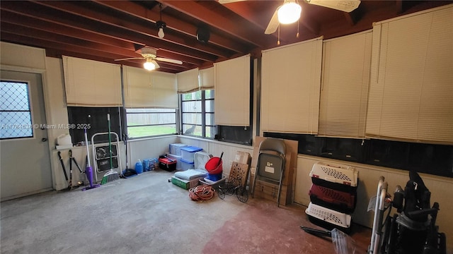 521 N 70th Way, Hollywood, FL 33024 - kitchen with ceiling fan, unfinished concrete floors, and beam ceiling