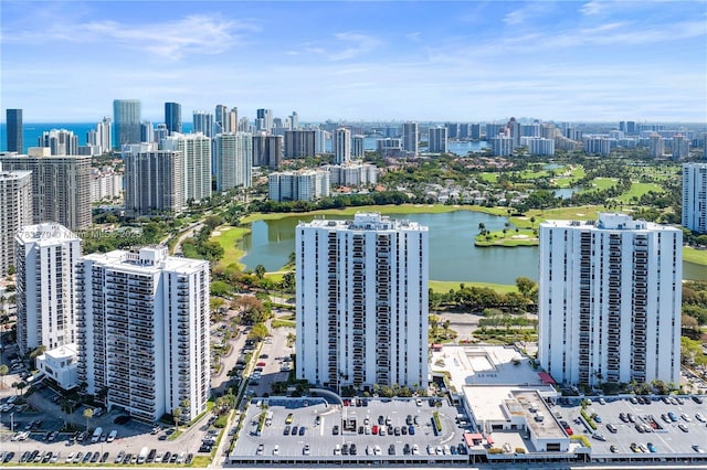aerial view featuring a water view and a view of city