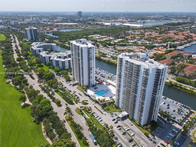 bird's eye view featuring a water view and a view of city