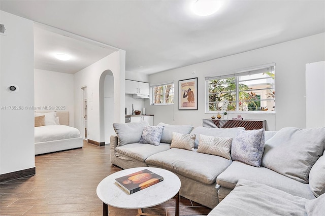 359 Meridian Ave Unit A105, Miami Beach, FL 33139 - living room featuring wood finished floors and baseboards