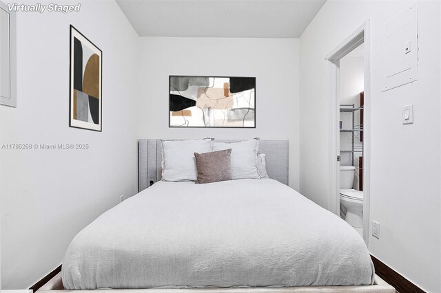 359 Meridian Ave Unit A105, Miami Beach, FL 33139 - bedroom featuring wood finished floors and baseboards