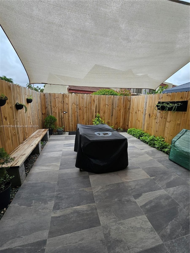 view of patio with a fenced backyard