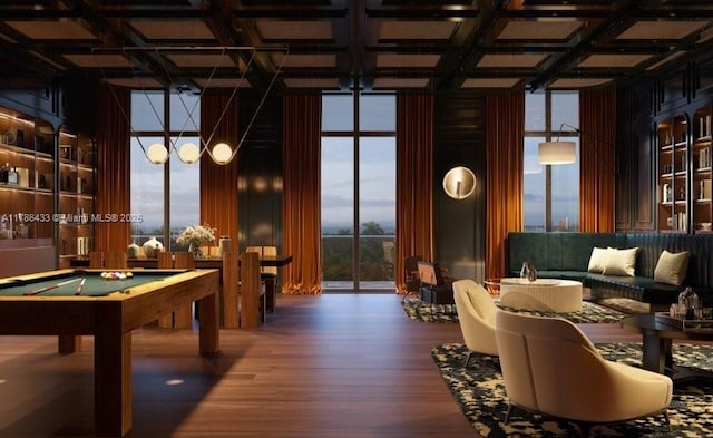 game room with expansive windows, a wealth of natural light, and coffered ceiling