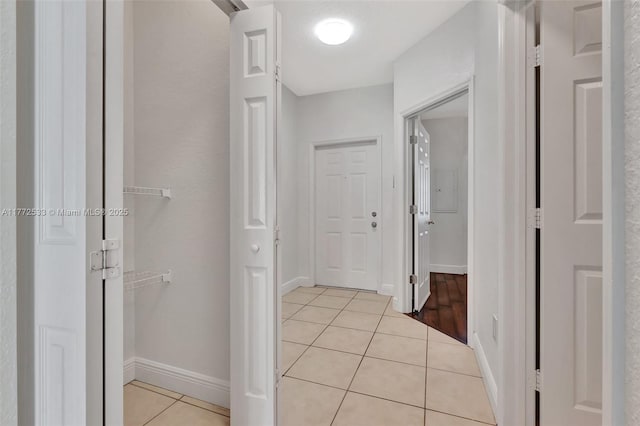 7848 Catalina Cir Unit 7848, Tamarac, FL 33321 - corridor featuring light tile patterned floors and baseboards