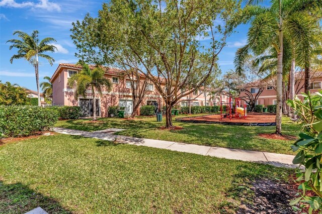 7848 Catalina Cir Unit 7848, Tamarac, FL 33321 - view of grassy yard