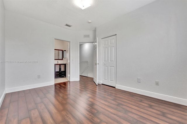 7848 Catalina Cir Unit 7848, Tamarac, FL 33321 - spare room featuring wood finished floors and baseboards