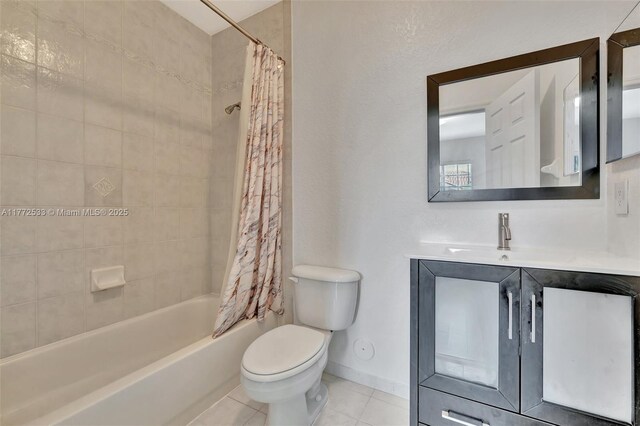 7848 Catalina Cir Unit 7848, Tamarac, FL 33321 - bathroom with toilet, tile patterned floors, shower / tub combo, vanity, and baseboards