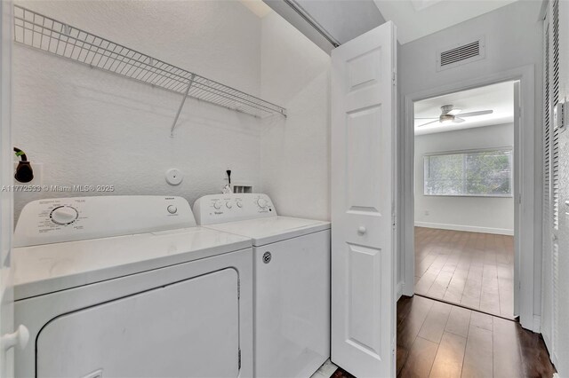 7848 Catalina Cir Unit 7848, Tamarac, FL 33321 - washroom featuring washer and dryer, baseboards, ceiling fan, and wood finished floors