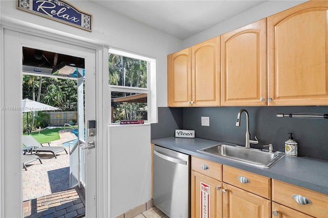 509 SW 13th St, Fort Lauderdale, FL 33315 - kitchen with dishwasher, light brown cabinets, a sink, and plenty of natural light