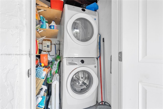 509 SW 13th St, Fort Lauderdale, FL 33315 - laundry room with stacked washer / dryer and laundry area