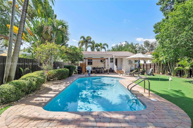 509 SW 13th St, Fort Lauderdale, FL 33315 - view of pool with a fenced backyard, a patio, and a fenced in pool