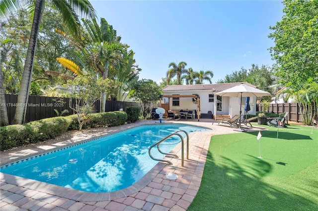 509 SW 13th St, Fort Lauderdale, FL 33315 - view of pool featuring a patio area, a fenced backyard, and a fenced in pool