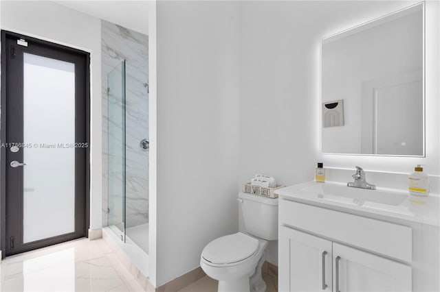 full bathroom with marble finish floor, toilet, vanity, baseboards, and a marble finish shower