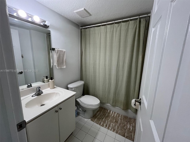 22701 SW 88th Pl Unit 203-9, Cutler Bay, FL 33190 - bathroom with vanity, a textured ceiling, tile patterned flooring, and shower / tub combo