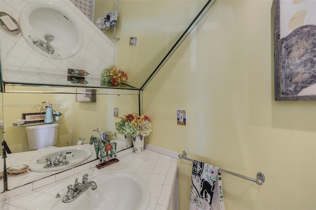 837 Espanola Way, Miami Beach, FL 33139 - bathroom with vanity, tile patterned flooring, and toilet