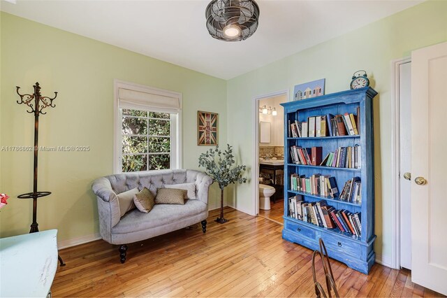 837 Espanola Way, Miami Beach, FL 33139 - sitting room with baseboards and light wood-style floors