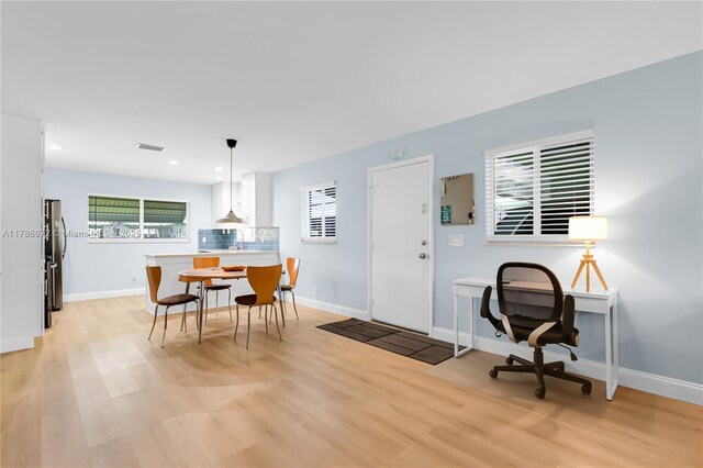 632 Hummingbird Ln, Delray Beach, FL 33445 - living room with wood finished floors, ceiling fan, and baseboards