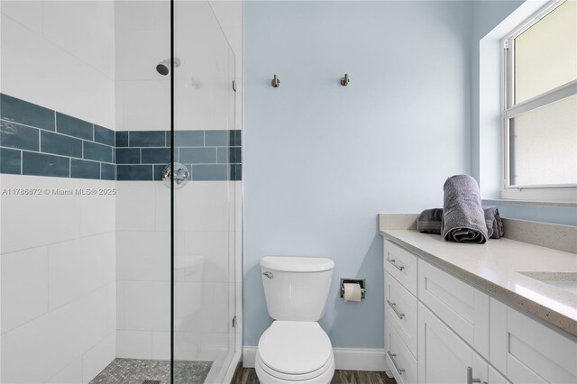 632 Hummingbird Ln, Delray Beach, FL 33445 - full bath with a tile shower, toilet, and vanity