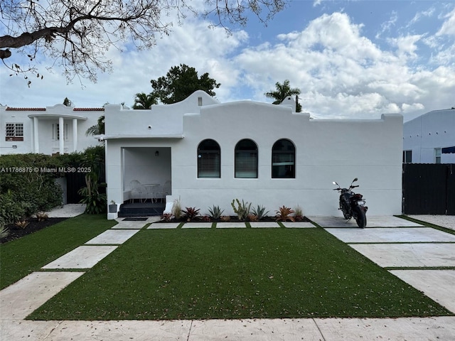 2360 SW 12th St, Miami, FL 33135 - mediterranean / spanish-style home with a front lawn and stucco siding