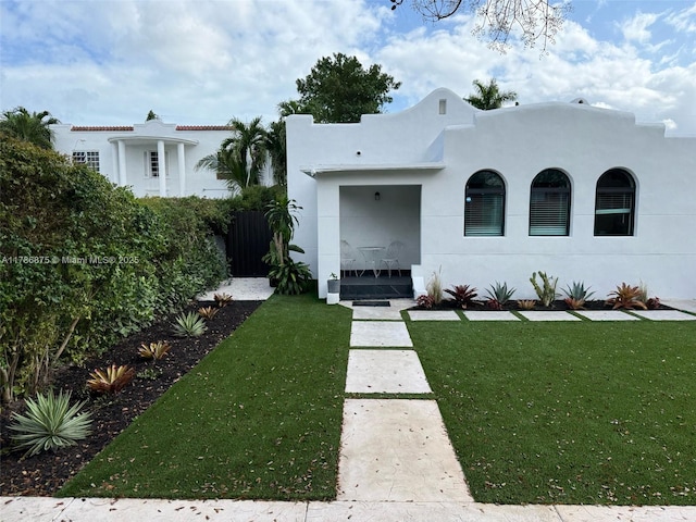 2360 SW 12th St, Miami, FL 33135 - mediterranean / spanish-style home featuring stucco siding and a front yard