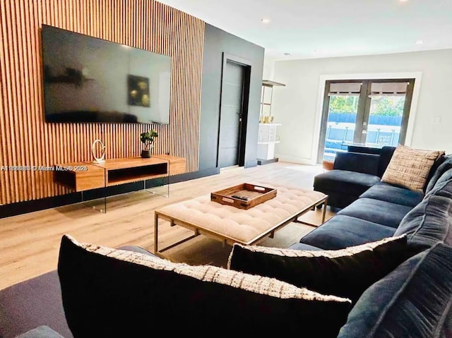 2360 SW 12th St, Miami, FL 33135 - living room with an accent wall, french doors, baseboards, recessed lighting, and wood finished floors