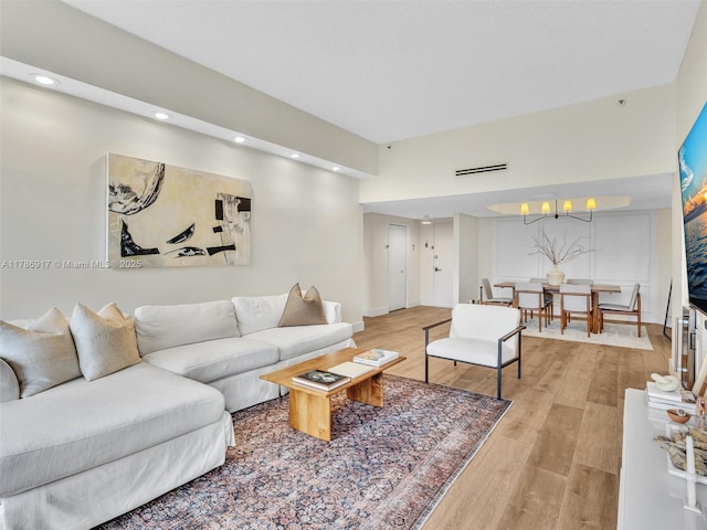20191 E Country Club Dr Unit 311, Aventura, FL 33180 - living area featuring recessed lighting, light wood-style flooring, and baseboards