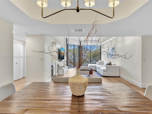 20191 E Country Club Dr Unit 311, Aventura, FL 33180 - interior space featuring visible vents, baseboards, and wood finished floors
