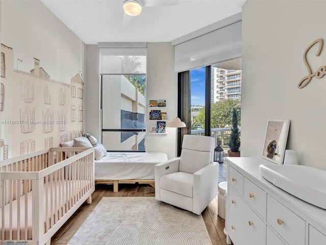 20191 E Country Club Dr Unit 311, Aventura, FL 33180 - bedroom with wood finished floors