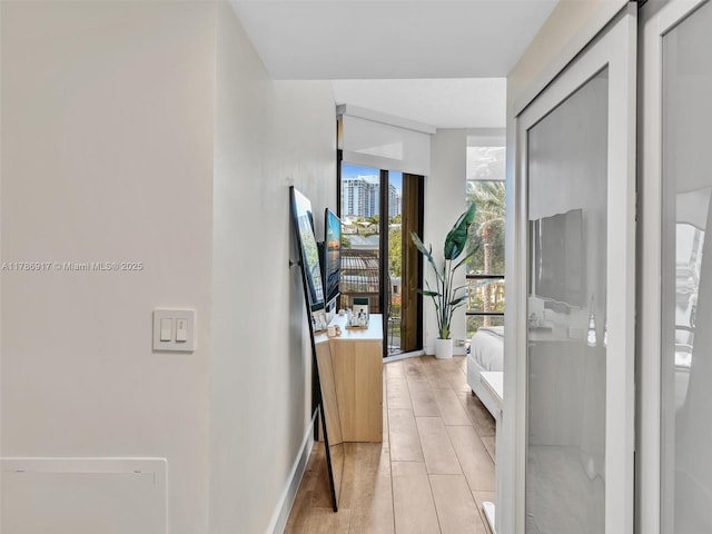 20191 E Country Club Dr Unit 311, Aventura, FL 33180 - hall with baseboards