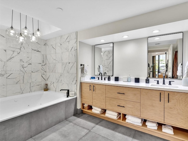 20191 E Country Club Dr Unit 311, Aventura, FL 33180 - bathroom featuring recessed lighting, a sink, double vanity, and a jetted tub