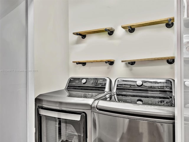 20191 E Country Club Dr Unit 311, Aventura, FL 33180 - washroom featuring washing machine and clothes dryer and laundry area