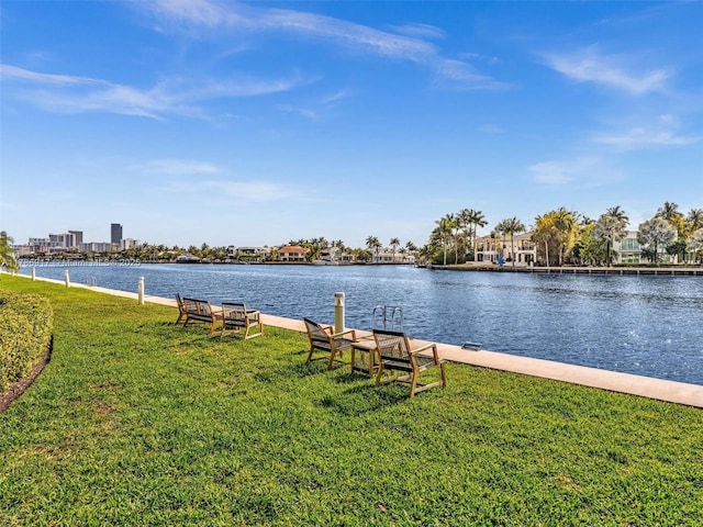 20191 E Country Club Dr Unit 311, Aventura, FL 33180 - view of dock with a yard and a water view