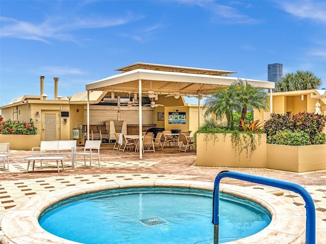 20191 E Country Club Dr Unit 311, Aventura, FL 33180 - view of swimming pool with a gazebo, a pool, outdoor dining space, a patio, and ceiling fan